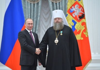 Президент Росії Володимир Путін та митрополит Меркурій